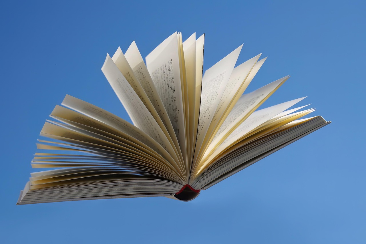 Floating book pages fantasy